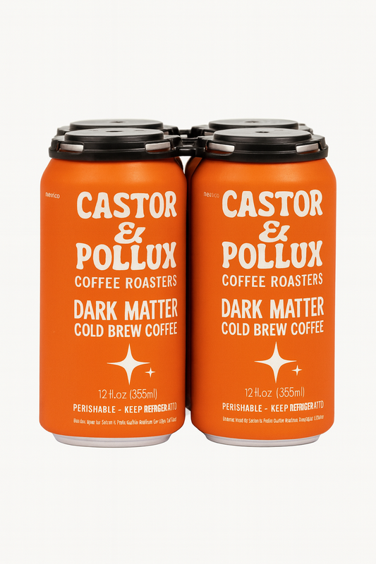 A four-pack of Castor & Pollux Coffee Roasters’ Dark Matter cold brew cans, featuring bold orange cans with cream lettering connected by a black carrier on a white background.