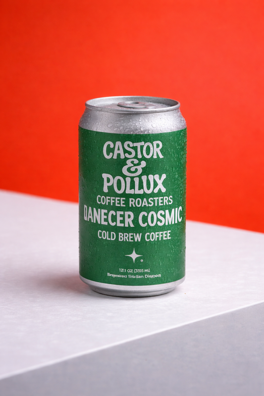 Green can of Castor & Pollux Danecer Cosmic cold brew coffee against a red and gray background