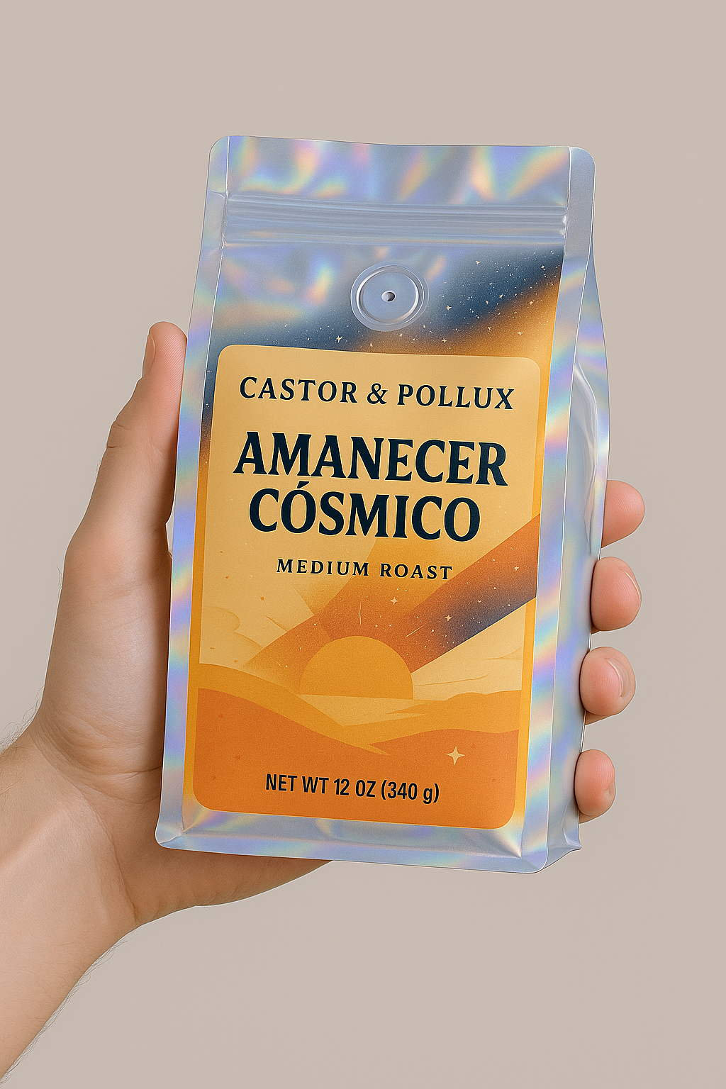 A hand holding a holographic bag of Cosmic Horizon medium roast Whole Bean coffee.